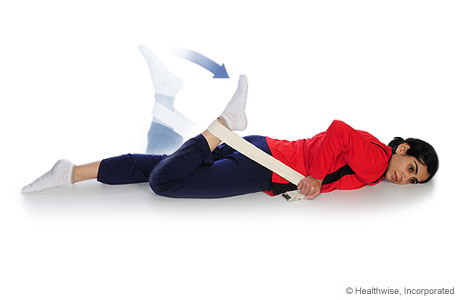 A person doing a quadricep stretch (facedown).