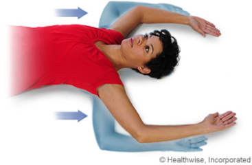 Picture of chest stretch exercise while lying down