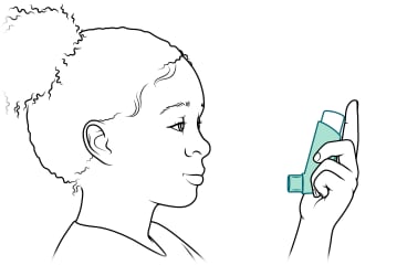 Child holding inhaler.