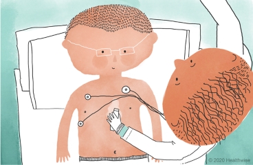 Jeff presses the camera wand onto Eduardo's chest Jeff presses the camera wand onto Eduardo's chest