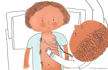 Jeff puts little stickers on Elsie's chest and arm Jeff puts little stickers on Elsie's chest and arm