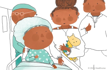 Saul's parents hold his stuffed dragon while Danny the nurse wheels Saul into the surgery room Saul's parents hold his stuffed dragon while Danny the nurse wheels Saul into the surgery room