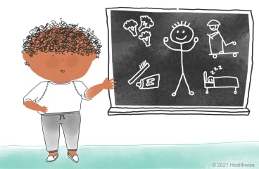 Hamid, next to a blackboard, shows some healthy choices. Hamid, next to a blackboard, shows some healthy choices.