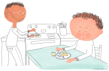Brannon desayuna mientras su papá cocina Brannon desayuna mientras su papá cocina