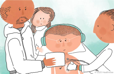 Eduardo mira dibujos animados mientras Jeff mueve la varilla con la cámara Eduardo mira dibujos animados mientras Jeff mueve la varilla con la cámara
