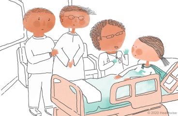 Fernanda en su habitación del hospital con sus padres y su enfermera