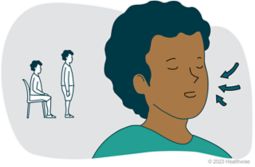 Un niño respira profundamente para prepararse para utilizar el espirómetro.