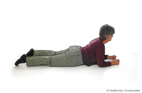 Press-up back extension for ankylosing spondylitis (front of hips on floor)
