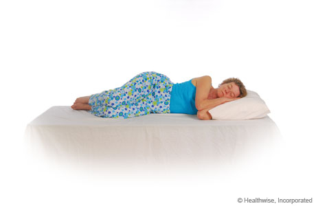 Lie on your side with your back straight. Lie on your side with your back straight.