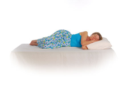 Lie on your side with your back straight.